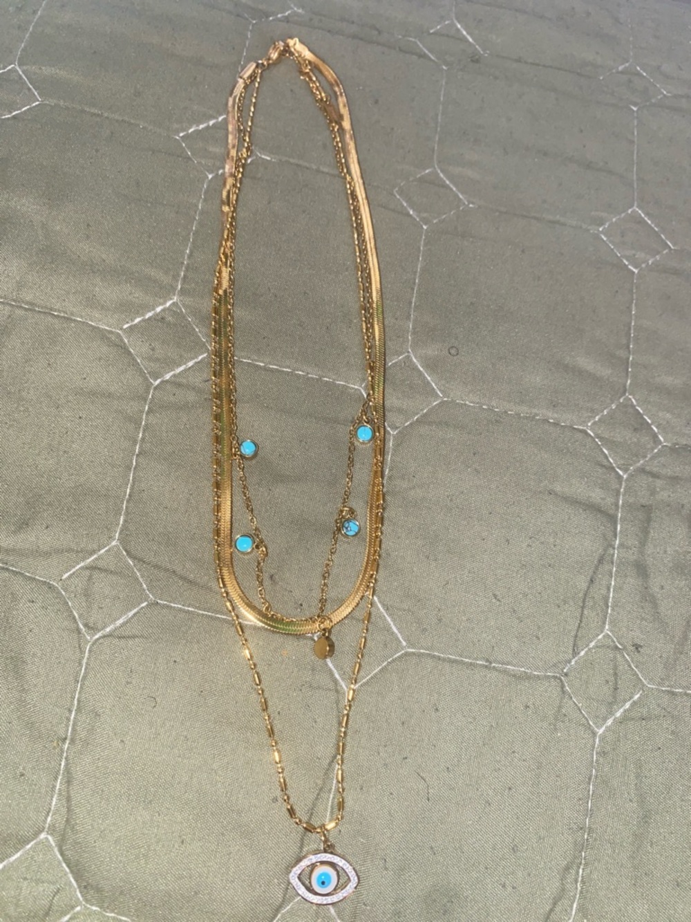 Gold Layered Necklace with Turquoise Accents and Eye Pendant